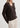 Woman wearing a brown cardigan against a white background