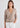 Woman wearing hazel alpaca cardigan