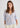Woman wearing pale blue cardigan