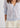 Woman wearing pale blue cardigan
