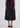 Woman wearing black top and skirt