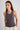 Woman wearing brown tank top
