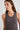 Woman wearing brown tank top