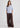Woman wearing pale blue cashmere t-shirt