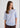 Woman wearing pale blue cashmere t-shirt