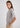 Woman wearing grey cashmere t-shirt