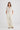 Woman in cream cashmere polo shirt