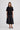 Woman in black cashmere shirt