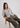Woman in a grey cashmere shirt