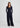 Woman wearing navy trousers