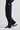 Woman wearing navy trousers