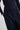 Woman wearing navy trousers