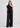 Woman wearing black one shoulder top