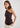 Woman wearing brown one shoulder top