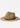 A natural straw fedora hat with a black band around the crown, photographed from the side against a clean white background.